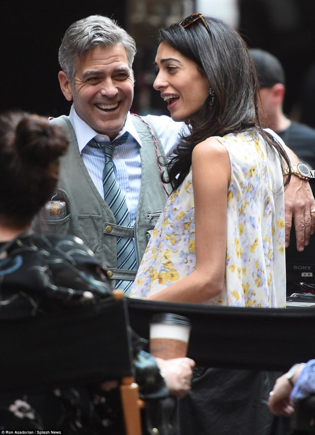 27B6710900000578-3044926-Happy_couple_Amal_Clooney_paid_husband_George_a_visit_on_set_in_-a-66_1429441259227