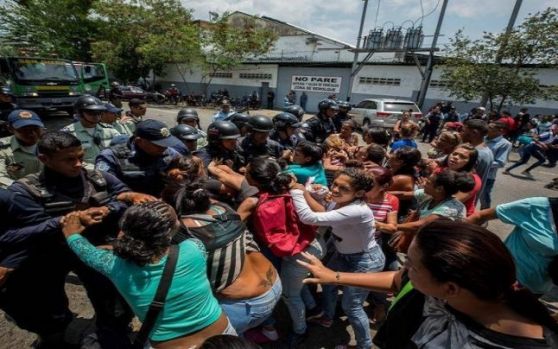 evadare esuata, venezuela, valencia, zeci de morti, incendiu, sectie politie